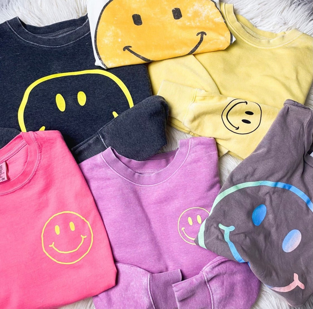 Smiley face shirts from Lush Fashion Lounge women's boutique in Oklahoma City