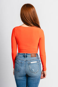 Square neck long sleeve bodysuit orange - Vintage OKC Basketball T-Shirts at Lush Fashion Lounge Boutique in Oklahoma City