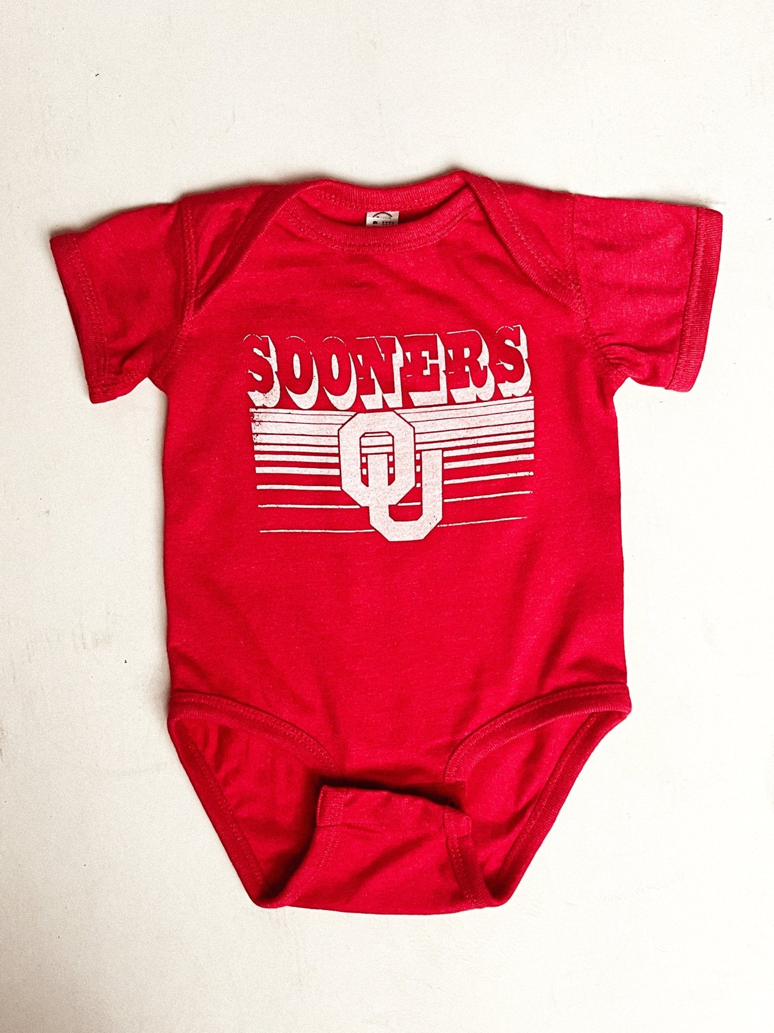 OU KIDS OU Sooners logo lines onesie red Onesie | Lush Fashion Lounge Trendy Oklahoma University Sooners Apparel & Cute Gameday T-Shirts