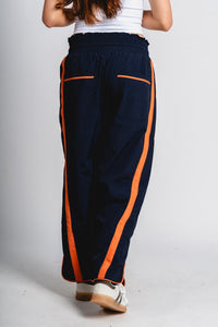 Windbreaker pants navy/orange - Trendy OKC Thunder T-Shirts at Lush Fashion Lounge Boutique in Oklahoma City