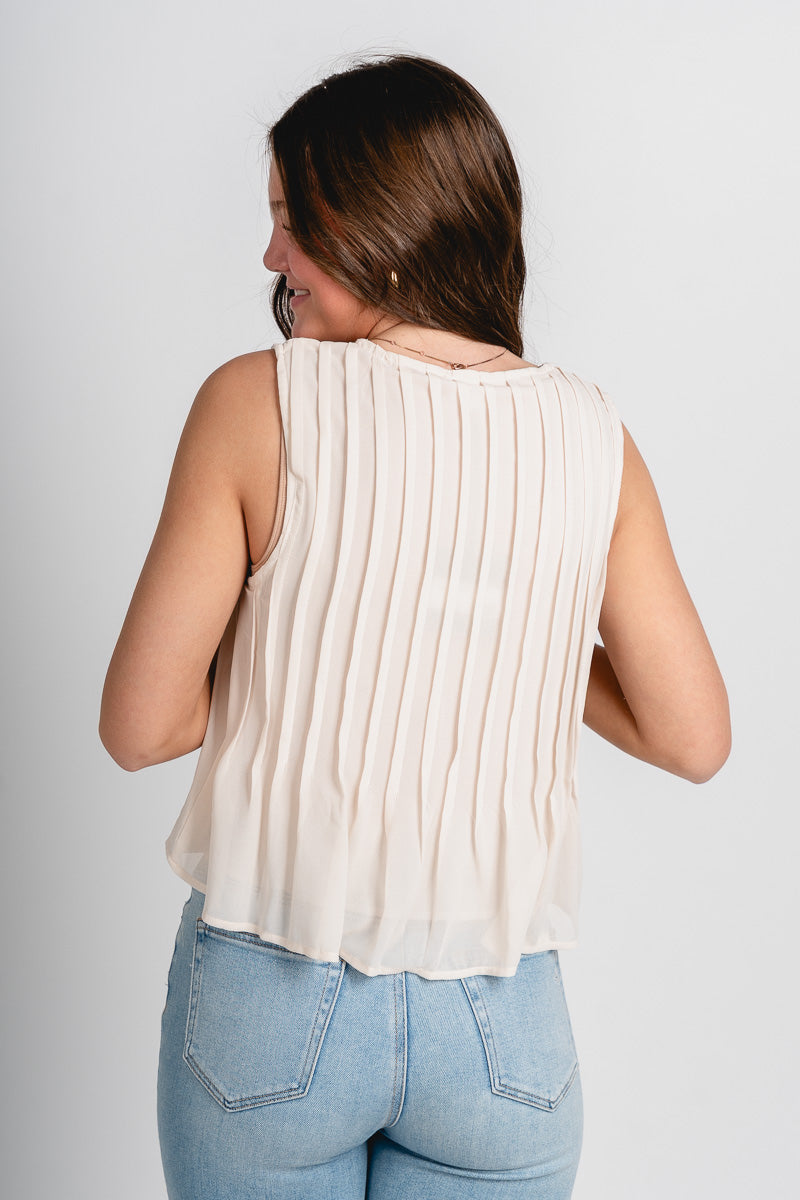 Pleated sleeveless top cream