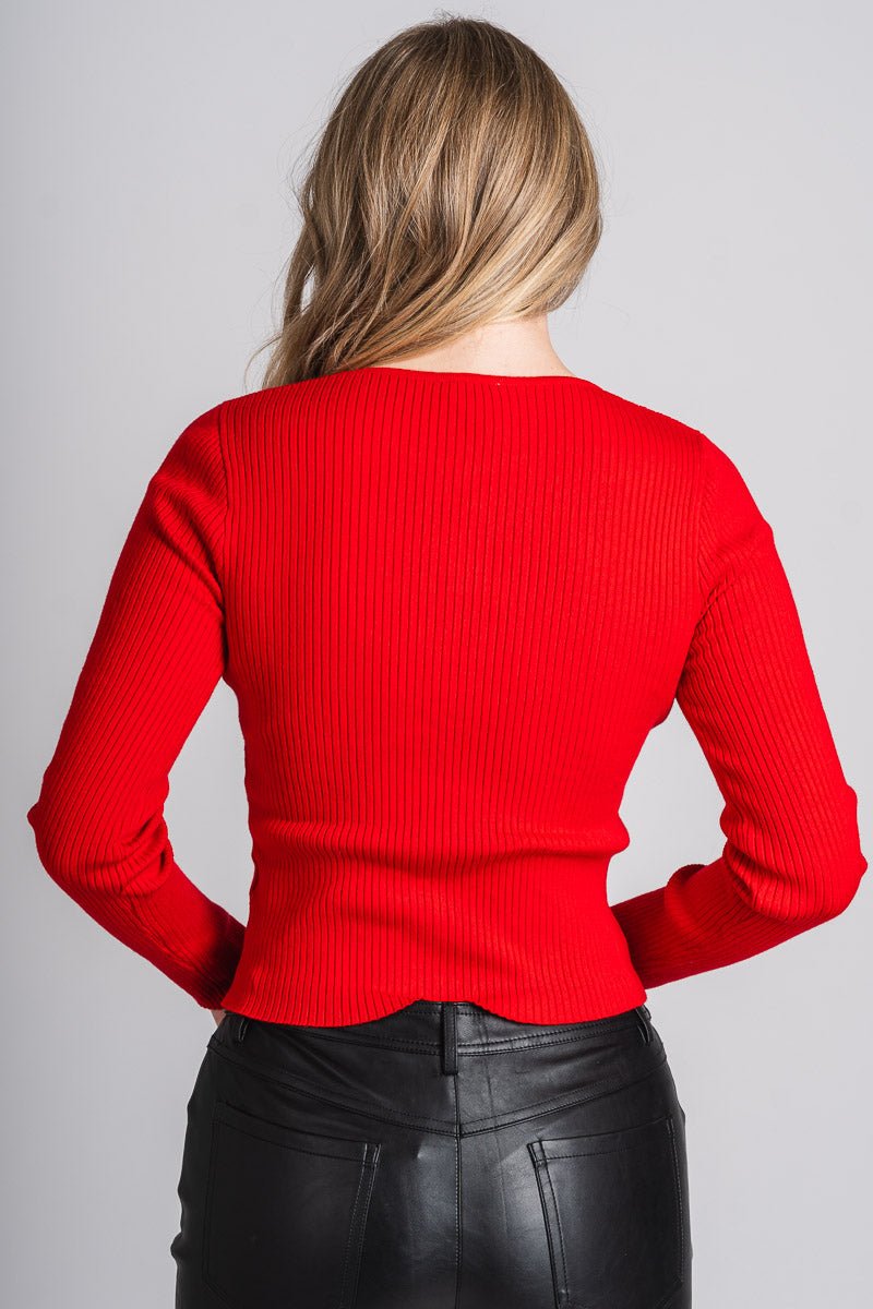 Bow detail long sleeve sweater red