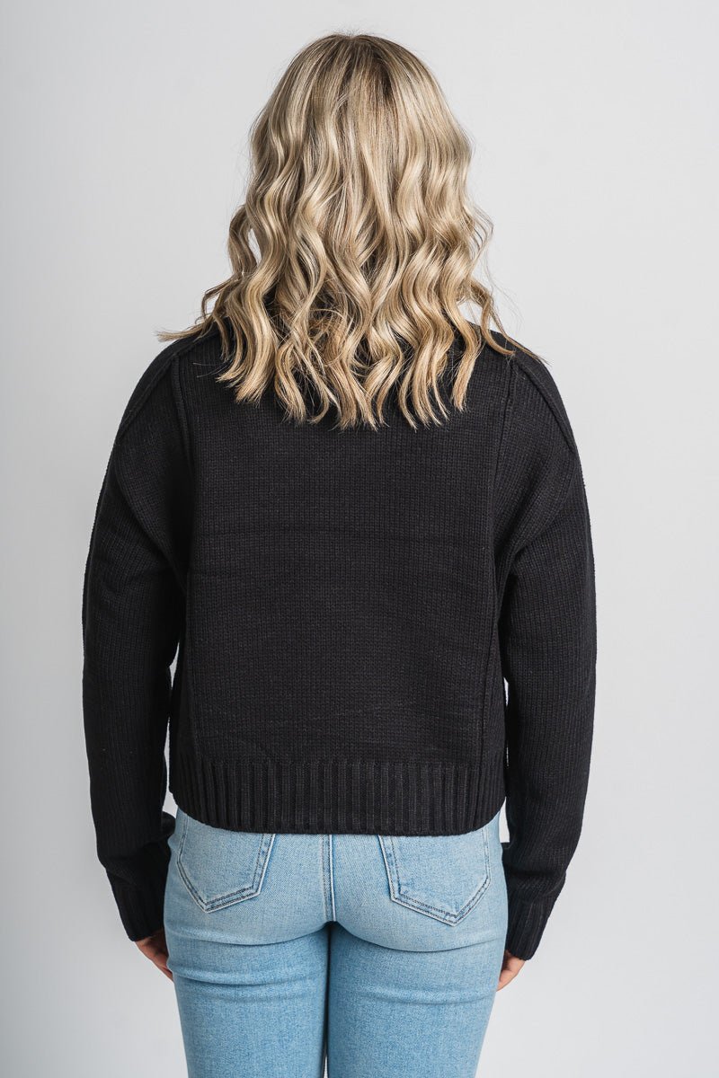 Reverse seam sweater black