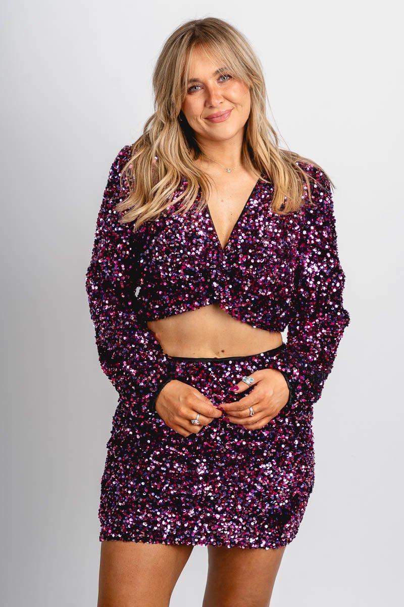 Twist long sleeve sequin top magenta