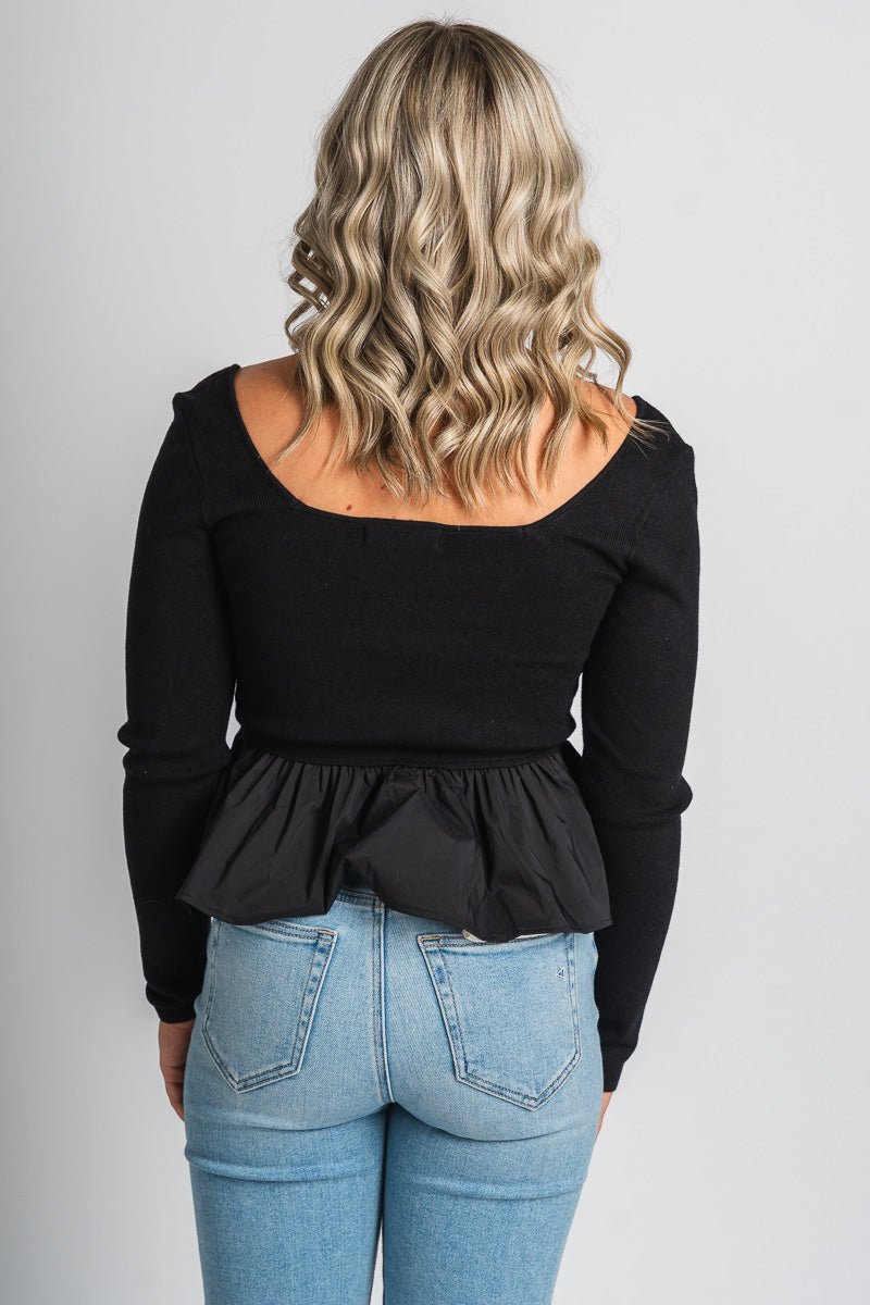 Ruffle bottom sweater black