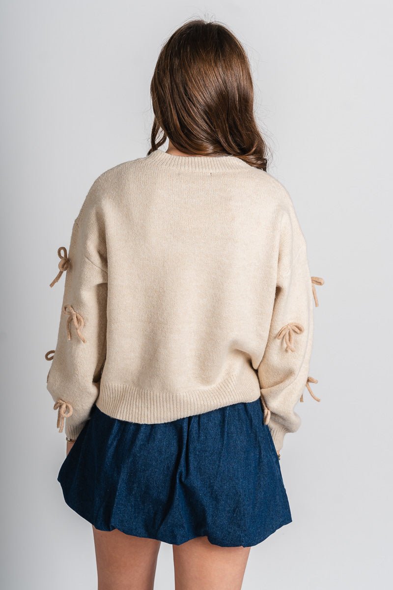 Bow embellished sweater ecru