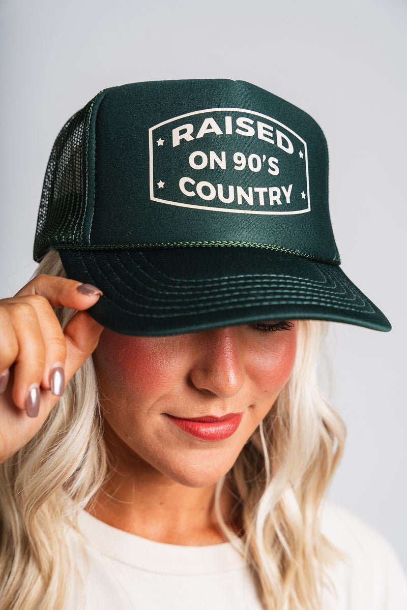 Raised on 90s country trucker hat forest green - Trendy Hats at Lush Fashion Lounge Boutique in Oklahoma City