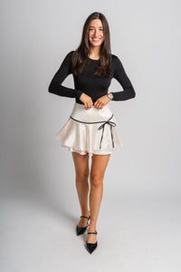 Satin bow mini skirt ivory | Lush Fashion Lounge: boutique fashion skirts, affordable boutique skirts, cute affordable skirts