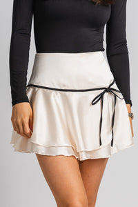 Satin bow mini skirt ivory | Lush Fashion Lounge: boutique fashion skirts, affordable boutique skirts, cute affordable skirts