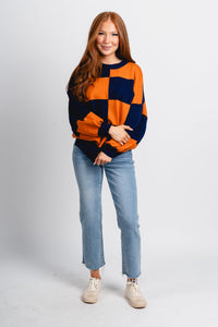 Checkered oversized sweater navy/orange - Oklahoma City inspired graphic t-shirts at Lush Fashion Lounge Boutique in Oklahoma City