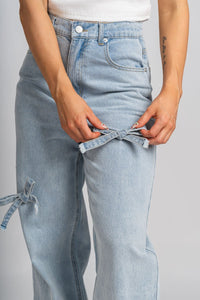 Bow detail wide leg jeans light denim | Lush Fashion Lounge: boutique women's jeans, fashion jeans for women, affordable fashion jeans, cute boutique jeans