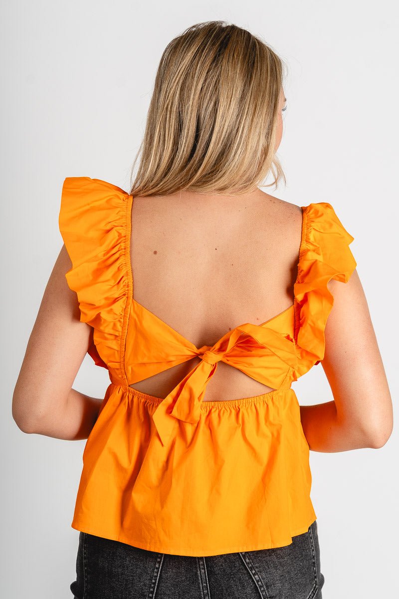 Ruffle sleeve tie back top orange