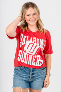 OU OU Sooners logo center unisex t-shirt red T-shirt | Lush Fashion Lounge Trendy Oklahoma University Sooners Apparel & Cute Gameday T-Shirts