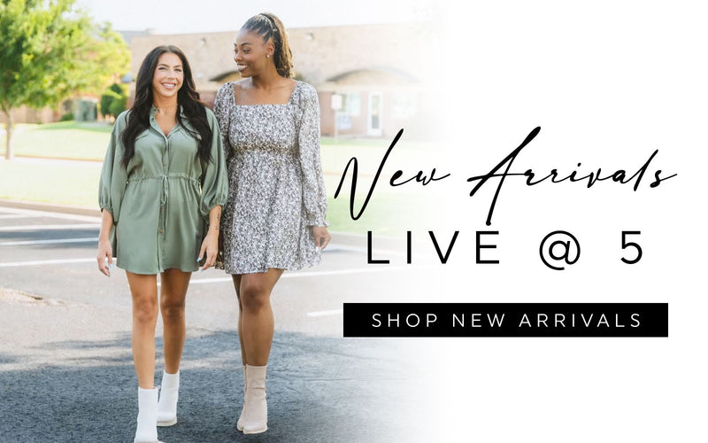 Two girls in Fall dresses modeling for Lush Fashion Lounge boutique in OKC 