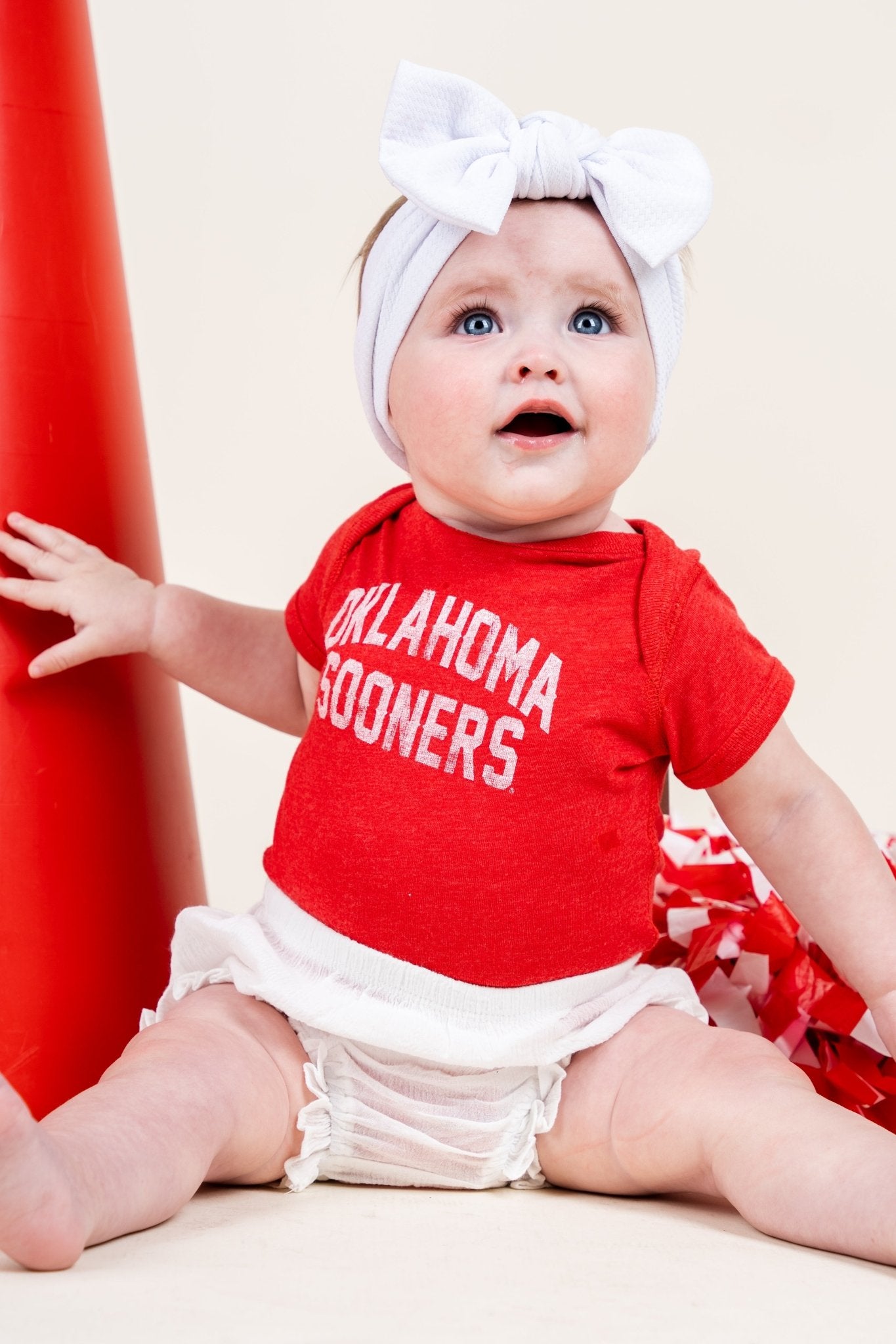 OU Kids OU Sooner classic arch onesie red Onesie | Lush Fashion Lounge Trendy Oklahoma University Sooners Apparel & Cute Gameday T-Shirts
