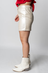 Metallic faux leather mini skirt ivory | Lush Fashion Lounge: boutique fashion skirts, affordable boutique skirts, cute affordable skirts
