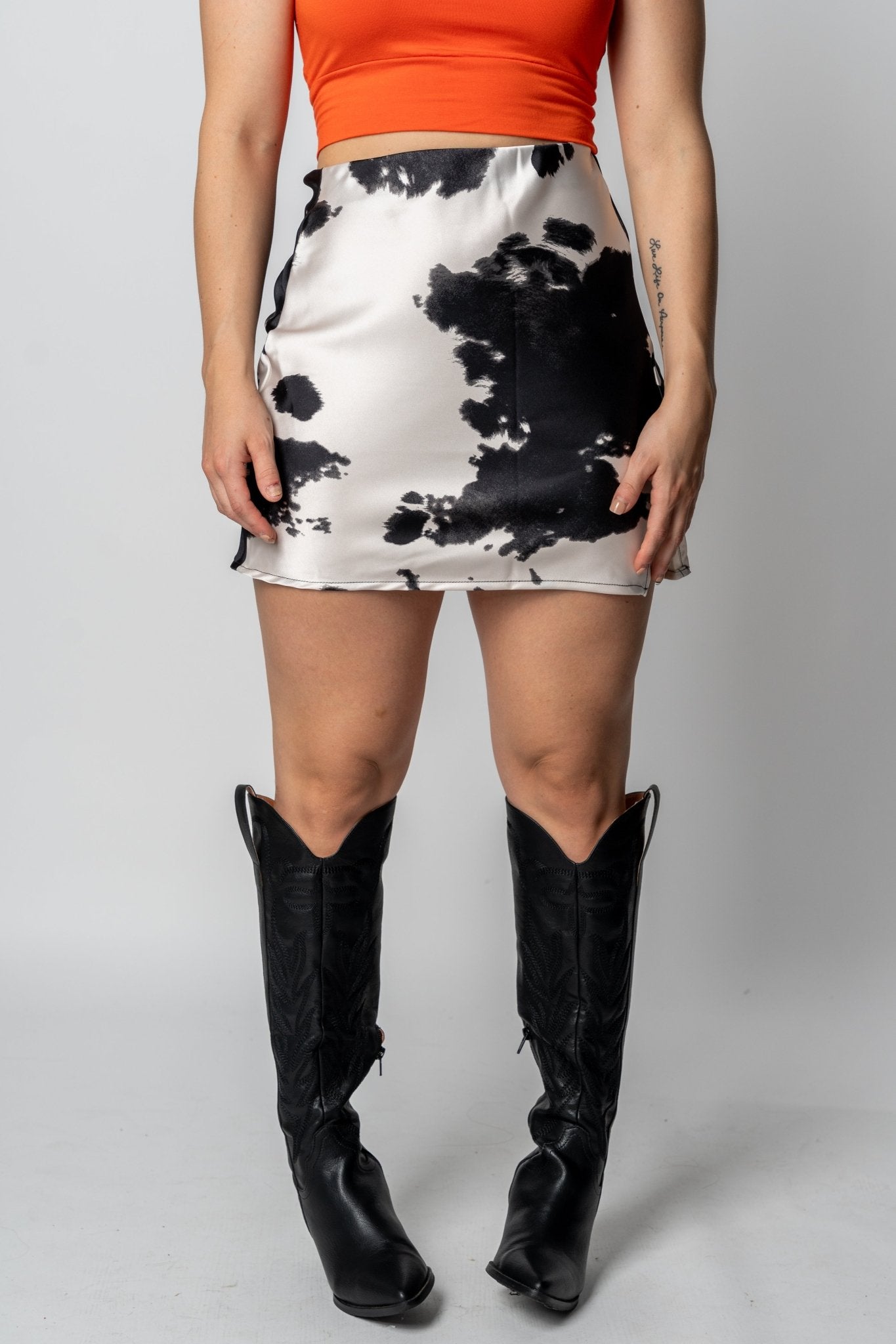 Cow print mini skirt ivory/black | Lush Fashion Lounge: boutique fashion skirts, affordable boutique skirts, cute affordable skirts