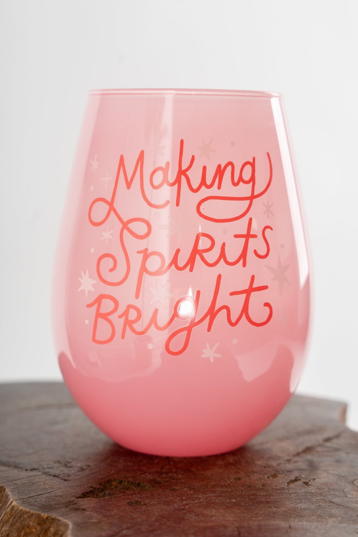 Making spirits bright 30 ounce stemless wine glass pink - Trendy Holiday Apparel at Lush Fashion Lounge Boutique in Oklahoma City