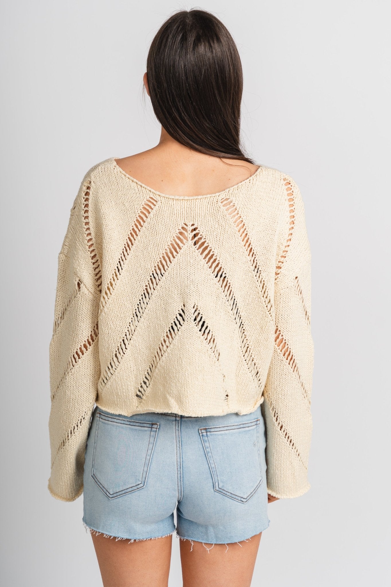 Distressed crop sweater natural