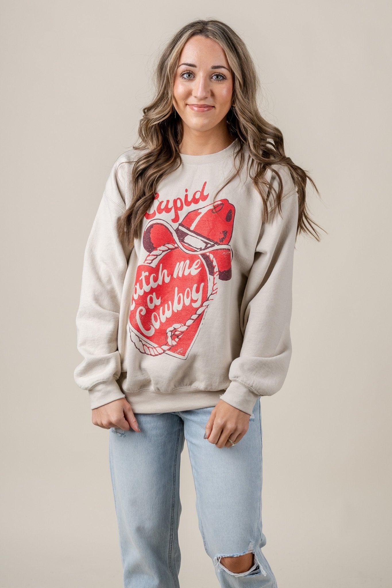 Cupid catch me a cowboy thrifted sweatshirt sand - Trendy Valentine's T-Shirts at Lush Fashion Lounge Boutique in Oklahoma City