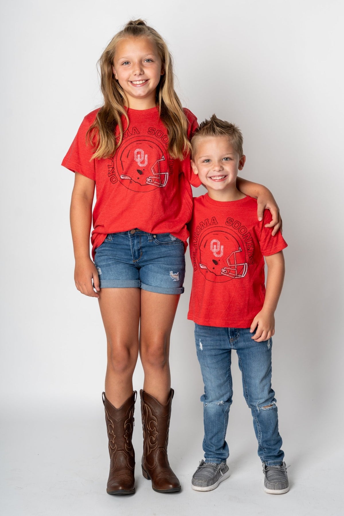 OU Kids OU helmet circle t-shirt red T-shirts | Lush Fashion Lounge Trendy Oklahoma University Sooners Apparel & Cute Gameday T-Shirts