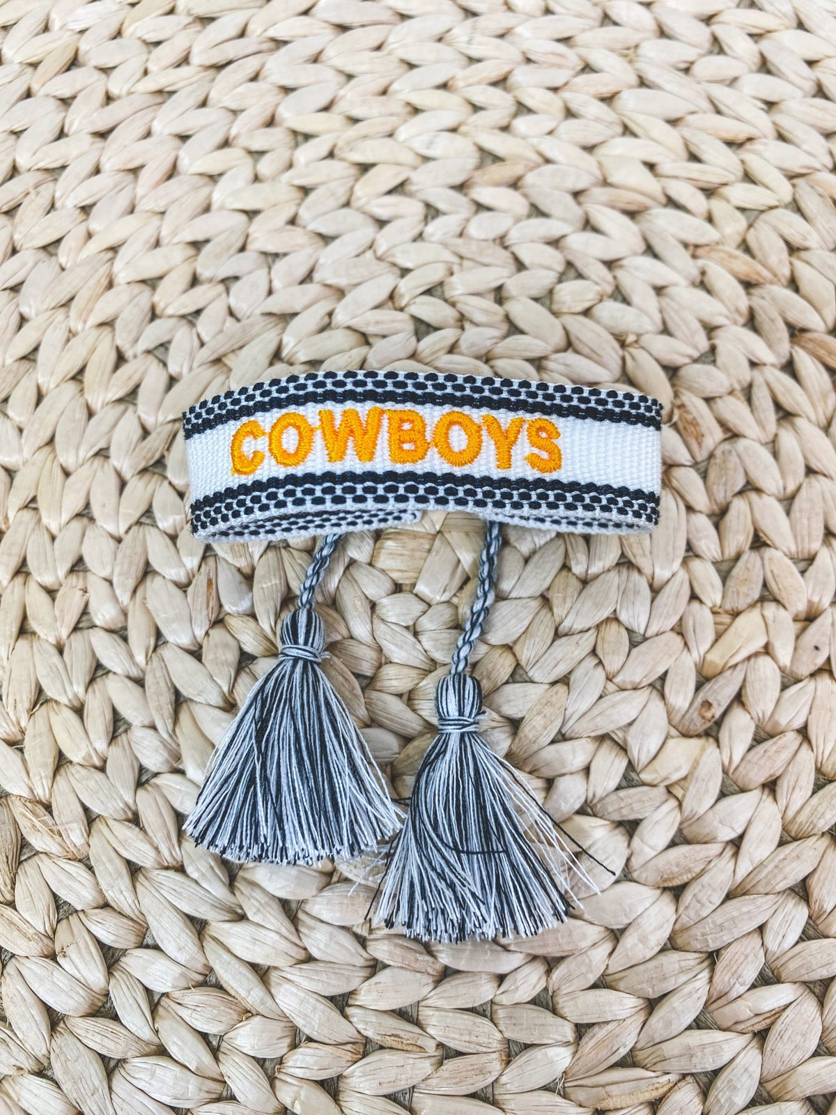 Cowboys tassel bracelet black/orange - Stylish Bracelets - Affordable Jewelry and Belts at Lush Fashion Lounge Boutique in Oklahoma City