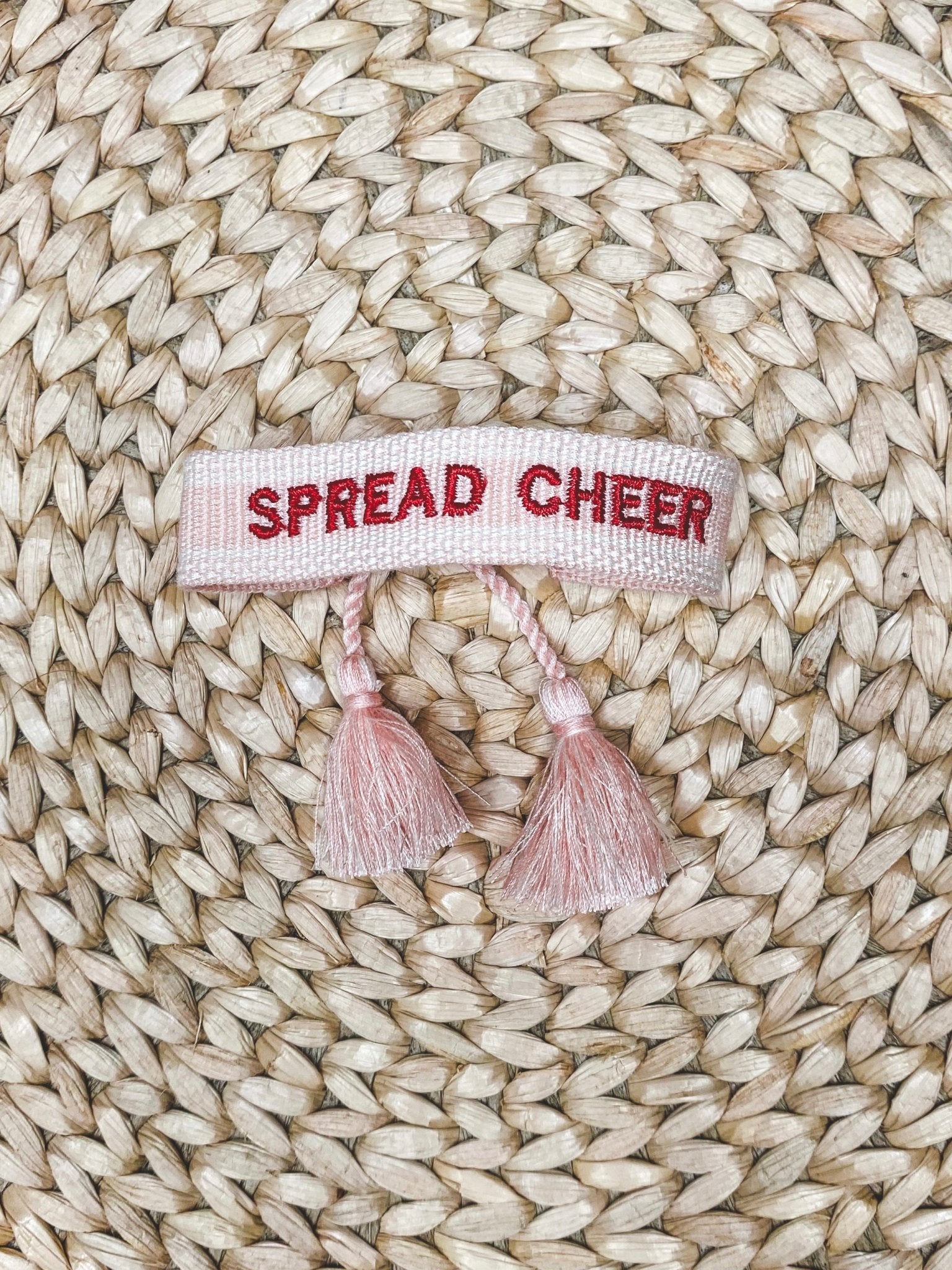 Spread Cheer bracelet light pink - Trendy Holiday Apparel at Lush Fashion Lounge Boutique in Oklahoma City